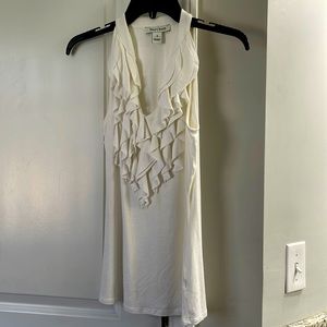 Woman’s sleeveless white top